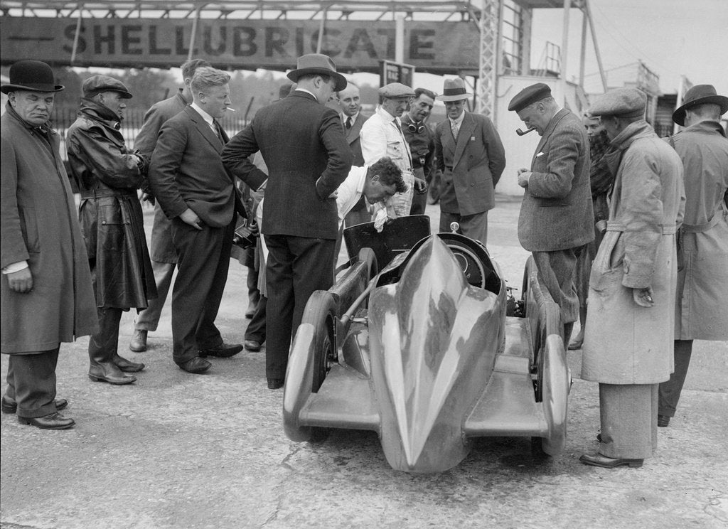 Detail of People examining Leon Cushman's Austin 7 racer at Brooklands for a speed record attempt, 1931 by Bill Brunell