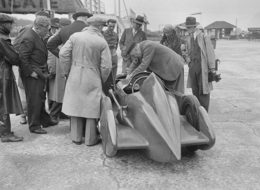 Detail of People examining Leon Cushman's Austin 7 racer at Brooklands for a speed record attempt, 1931 by Bill Brunell