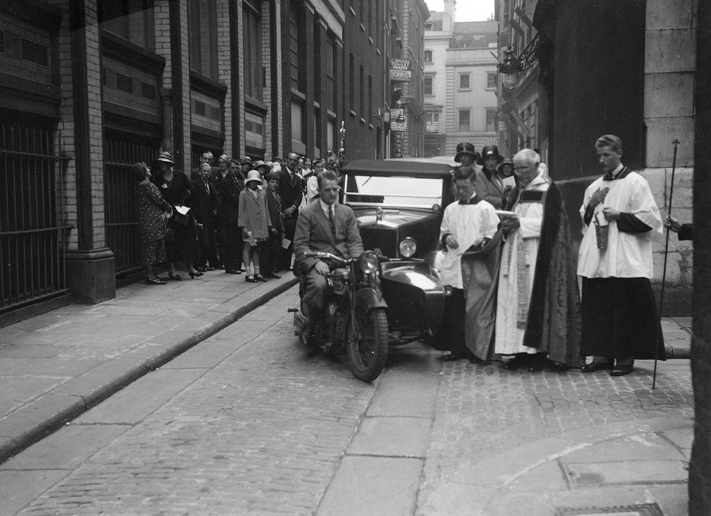 Detail of 600 cc Douglas motorcycle combination and a Morris Minor at a motor vehicle blessing ceremony by Bill Brunell