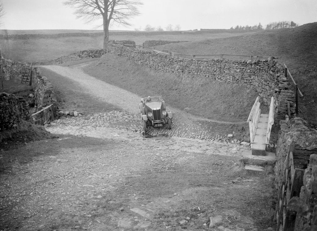 Detail of Kitty Brunell road testing a MG 18/80, Tan Hill, Yorkshire, April 1931 by Bill Brunell