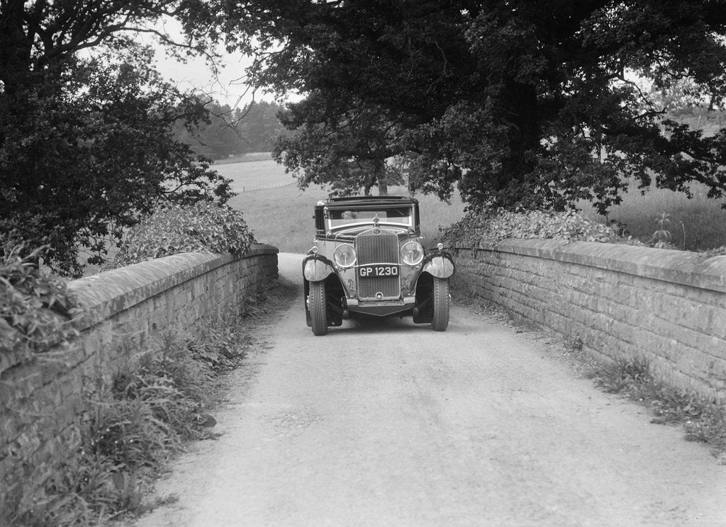 Detail of Kitty Brunell road testing a 1931 Delage D8 by Bill Brunell