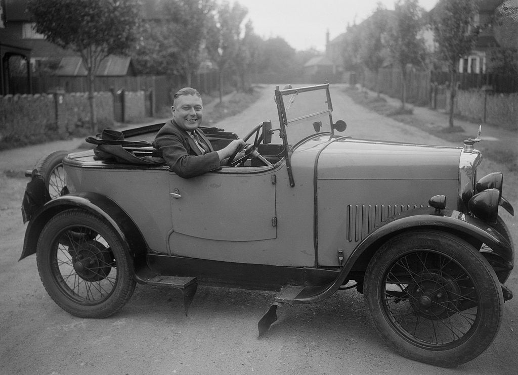 Detail of FA Thatcher behind the wheel of a 1929 Triumph Super Seven open four-seater by Bill Brunell