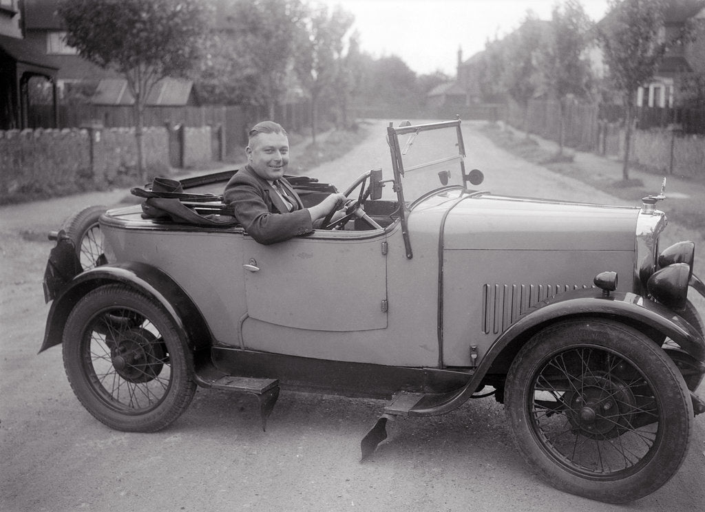 Detail of FA Thatcher behind the wheel of a 1929 Triumph Super Seven open four-seater by Bill Brunell