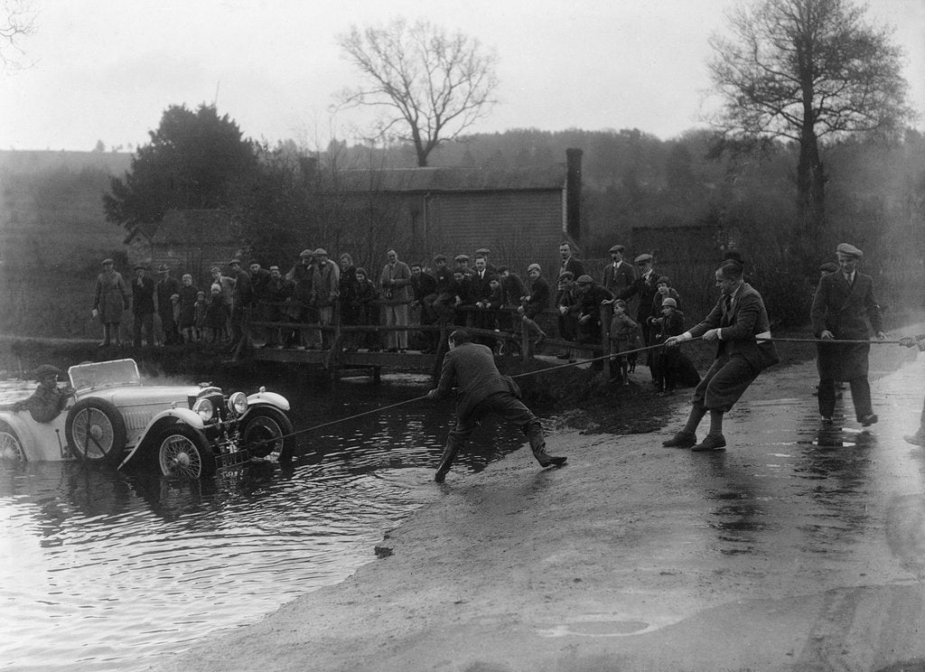 Detail of 1935 Frazer-Nash TT replica being pulled out of a ford during a motoring trial, 1936 by Bill Brunell