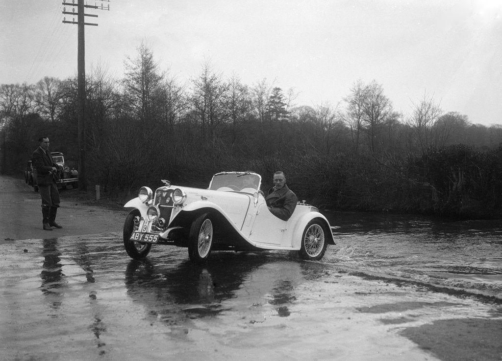Detail of 972 cc Singer Le Mans driving through a ford during a motoring trial, 1936 by Bill Brunell