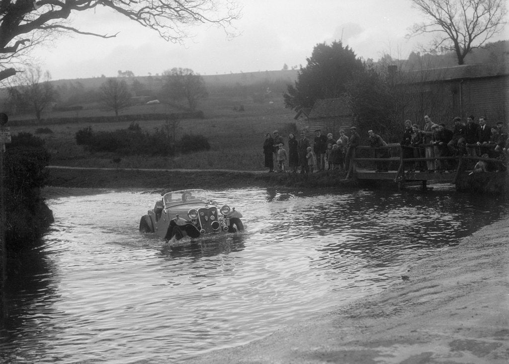 Detail of 972 cc Singer Le Mans driving through a ford during a motoring trial, 1936 by Bill Brunell
