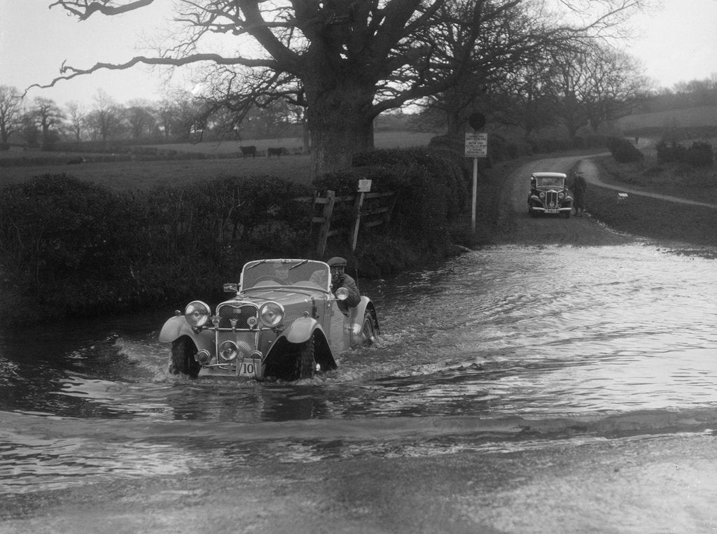 Detail of 972 cc Singer Le Mans driving through a ford during a motoring trial, 1936 by Bill Brunell