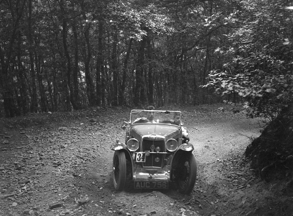 Detail of MG J2 competing in the B&HMC Brighton-Beer Trial, Fingle Bridge Hill, Devon, 1934 by Bill Brunell