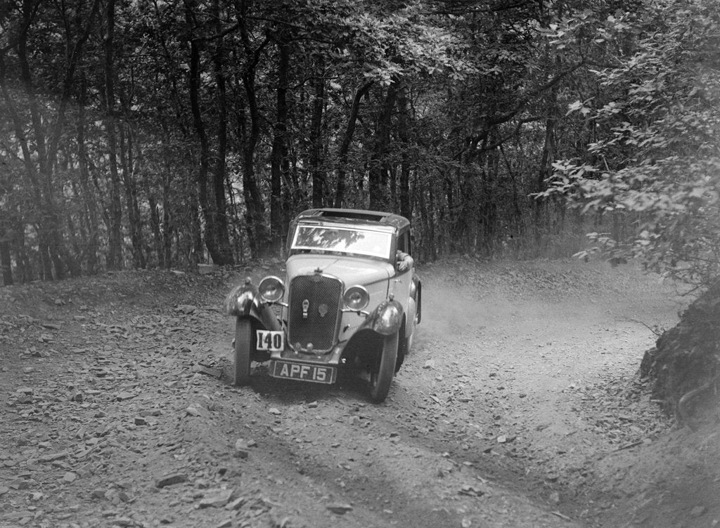 Detail of Singer coupe competing in the B&HMC Brighton-Beer Trial, Fingle Bridge Hill, Devon, 1934 by Bill Brunell