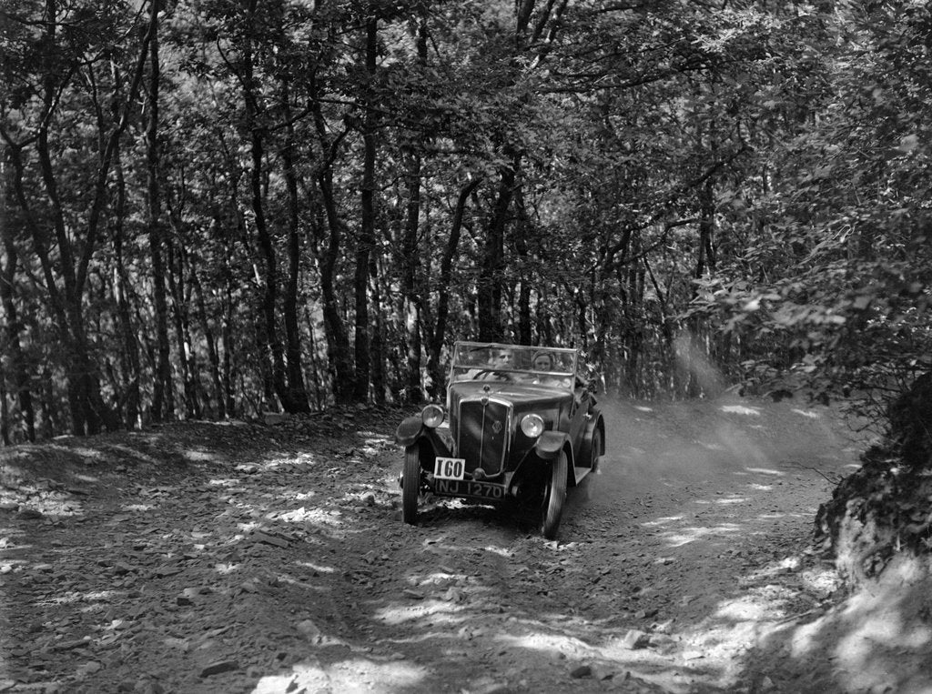 Detail of Morris Minor competing in the B&HMC Brighton-Beer Trial, Fingle Bridge Hill, Devon, 1934 by Bill Brunell