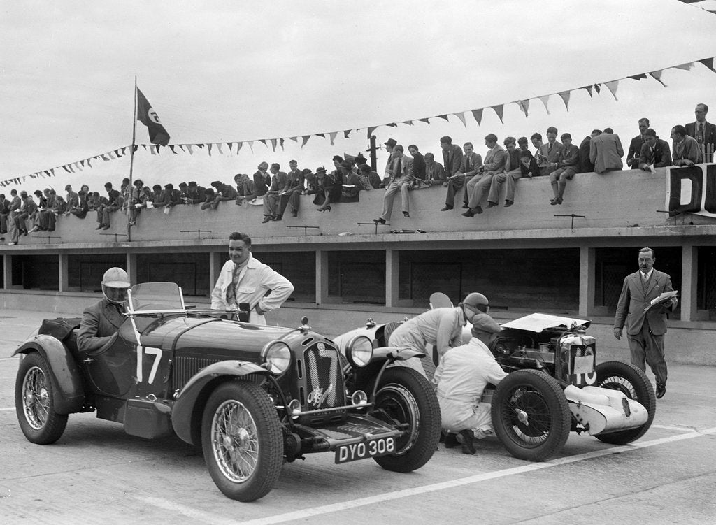 Detail of Alfa Romeo and supercharged MG Midget on the start line at Brooklands, 1938 or 1939 by Bill Brunell