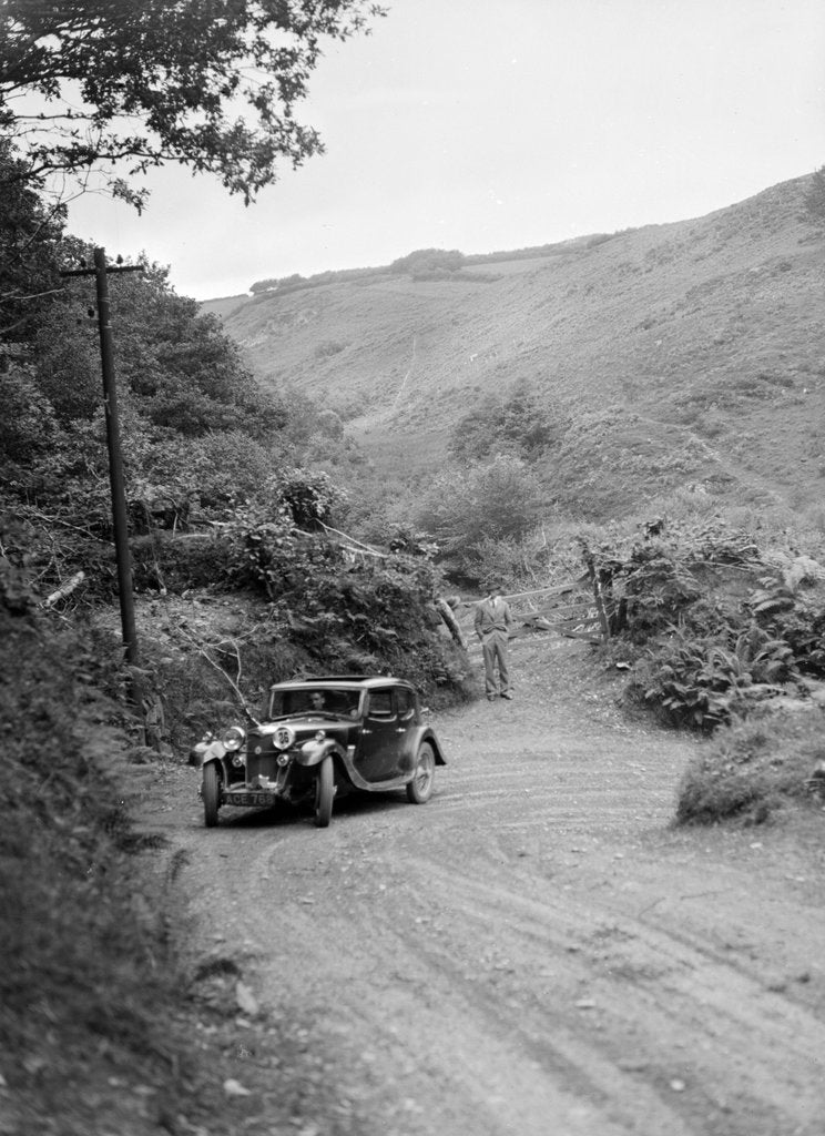 Detail of 1934 Riley Falcon saloon taking part in a motoring trial in Devon, late 1930s by Bill Brunell