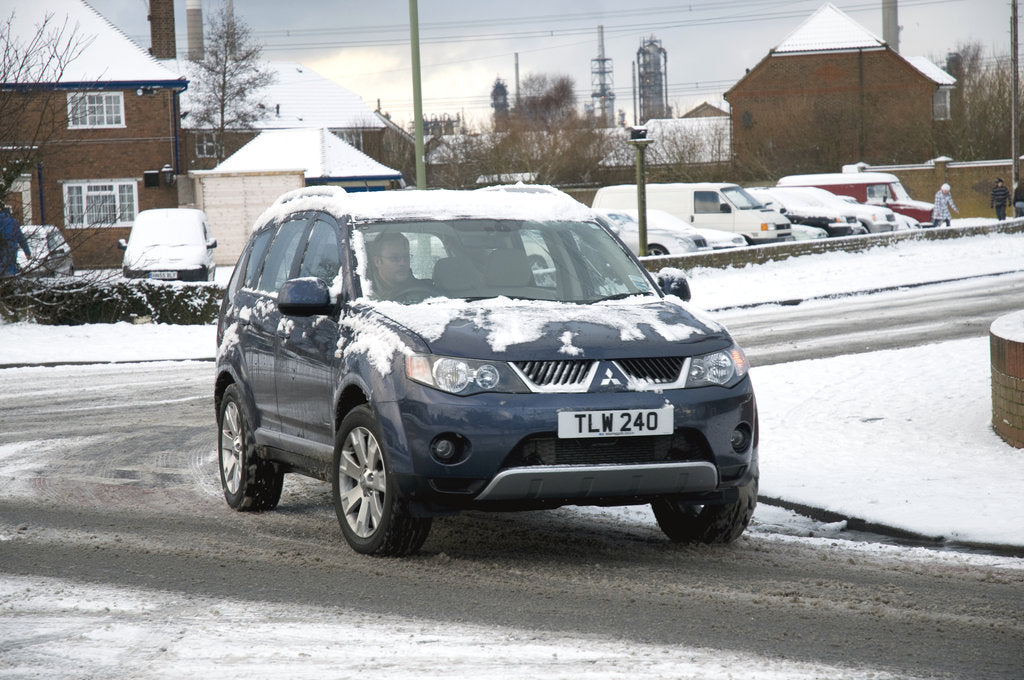 Detail of 2008 Mitsubishi Outlander driving in snow by Unknown