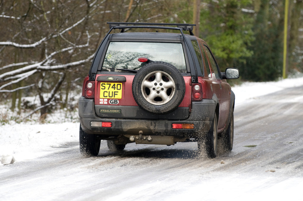Detail of 1998 Land Rover Freelander driving on icy road 2009 by Unknown