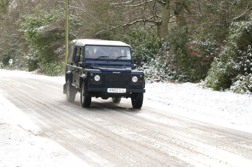Detail of 2002 Land Rover Defender driving on snowy road, 2009 by Unknown