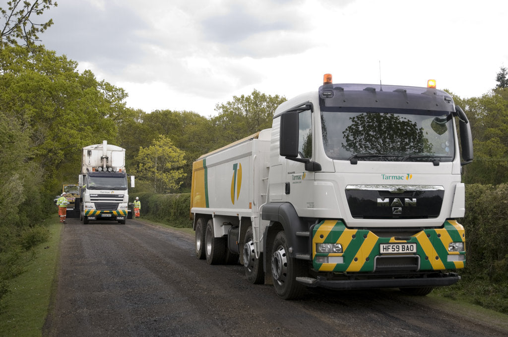 Detail of Road resurfacing work repairing potholes by Unknown