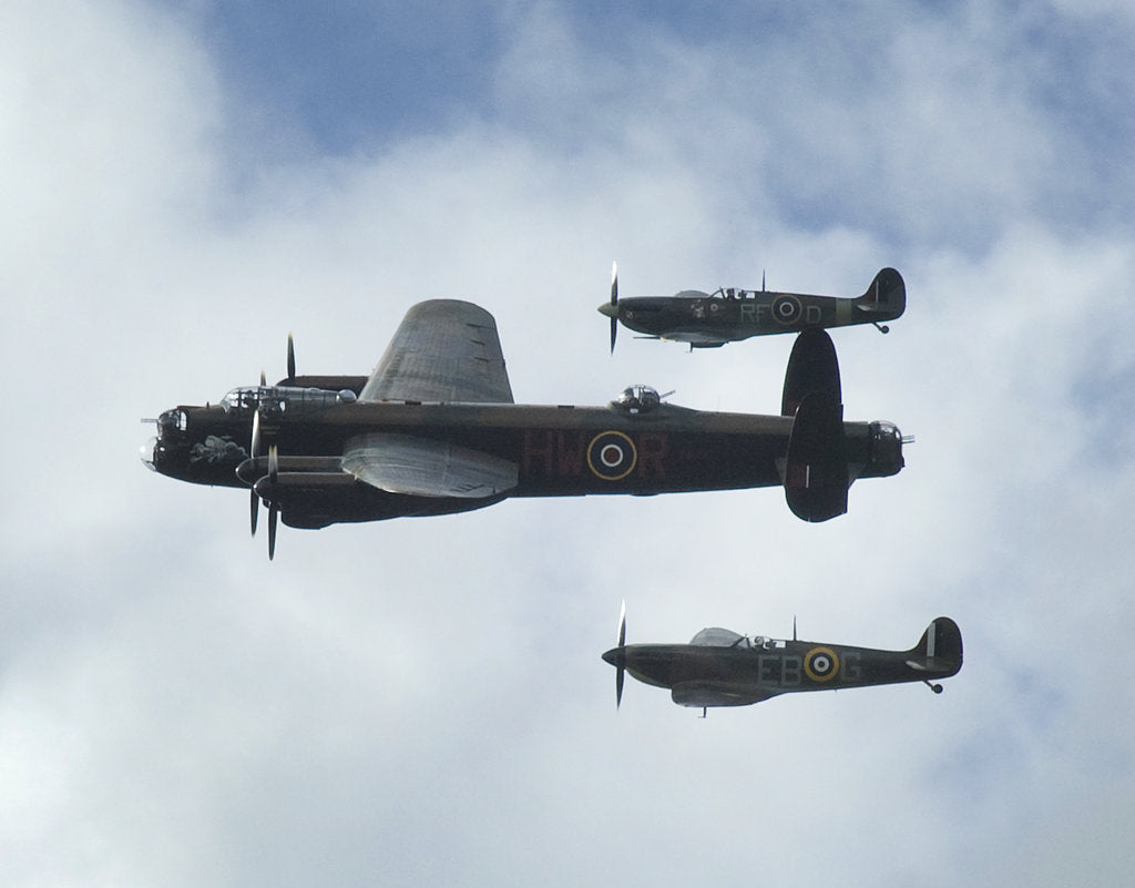 Detail of 2011 Goodwood Revival Meeting, Lancaster bomber and 2 Spitfires in aerial display by Unknown