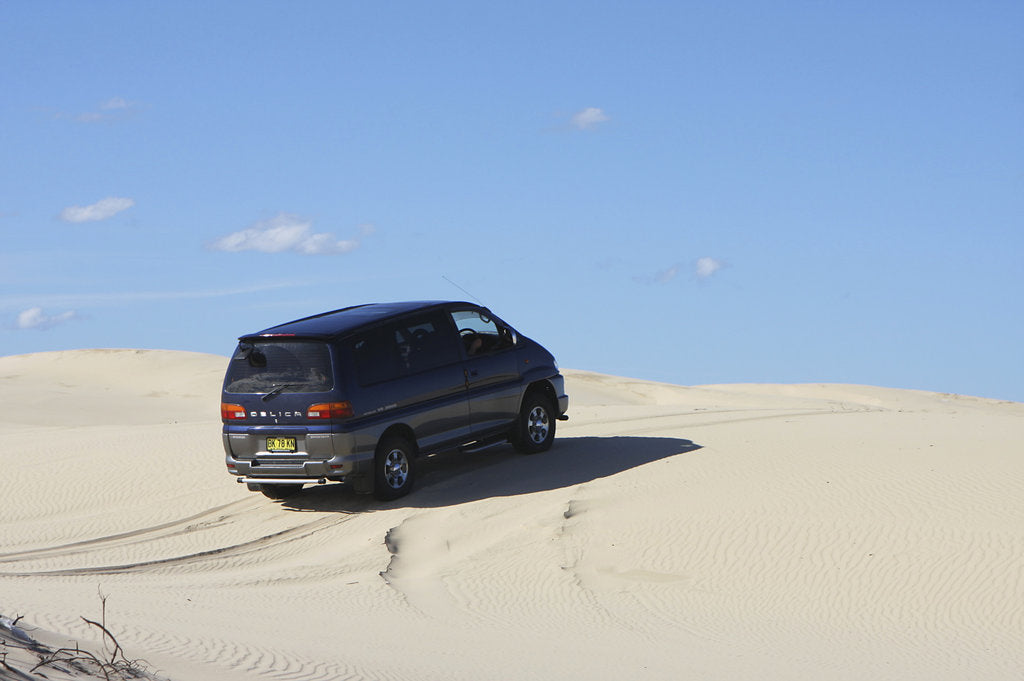 Detail of Mitsubishi Delica Space Gear V6 1996 in sand dunes New South Wales Australia by Unknown
