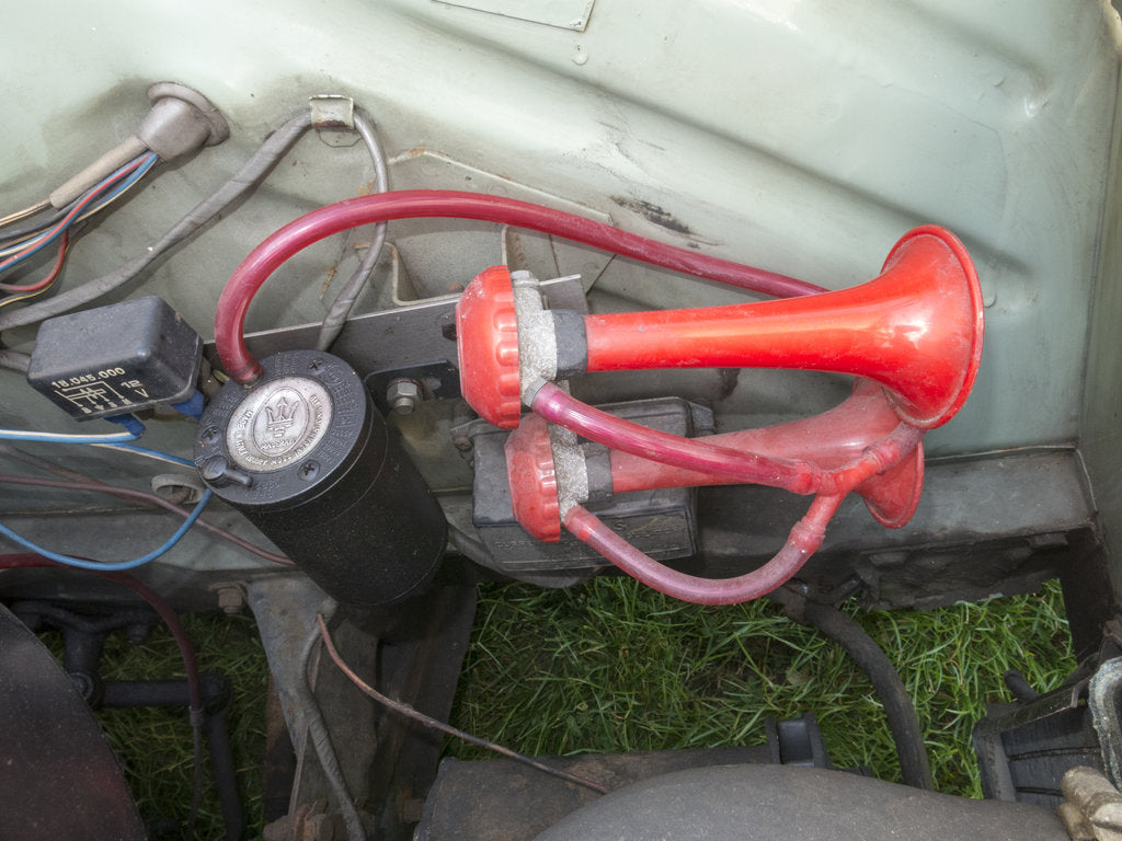 Detail of Maserati Air horn on a 1966 Ford Anglia by Unknown