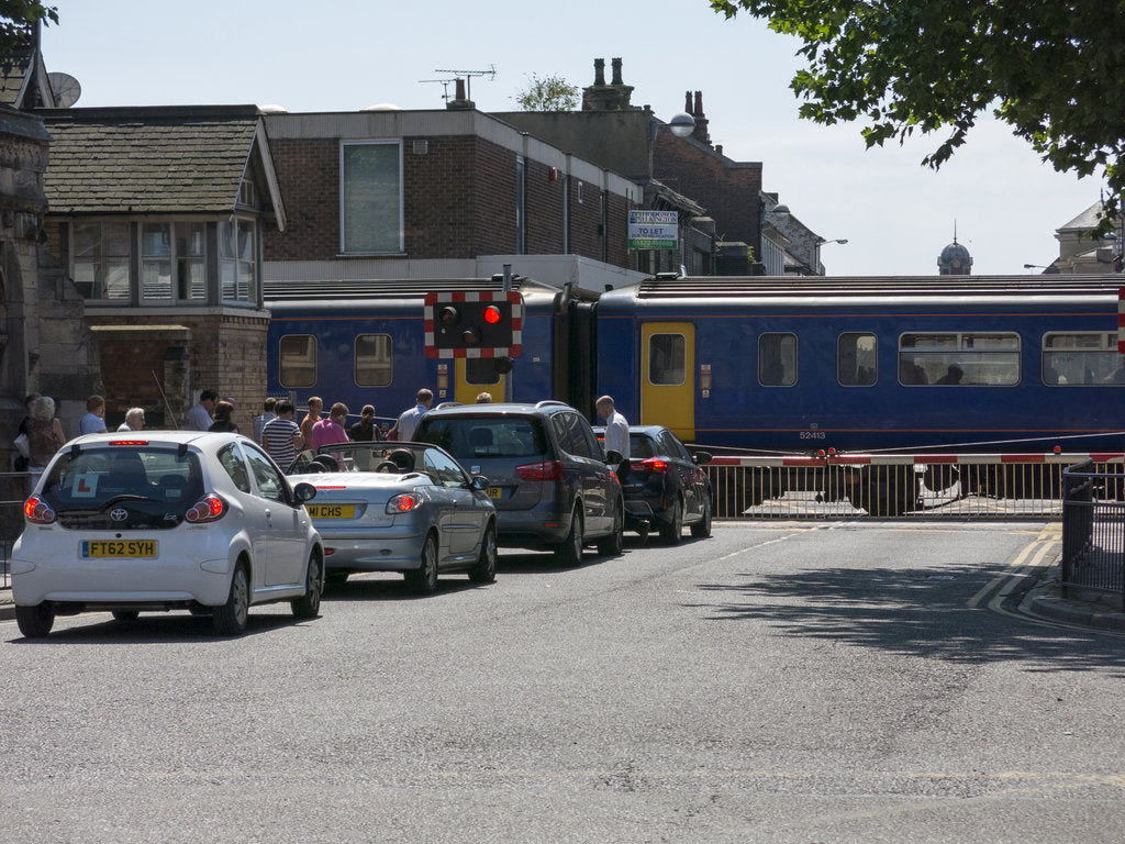 Detail of Train passing through level crossing in Lincoln 2014 by Unknown
