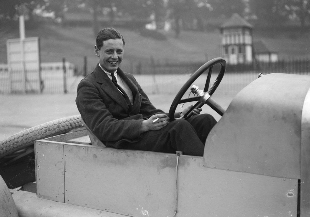 Detail of Bertie Kensington Moir in an Aston Martin crude test body, Brooklands, c1921 by Bill Brunell
