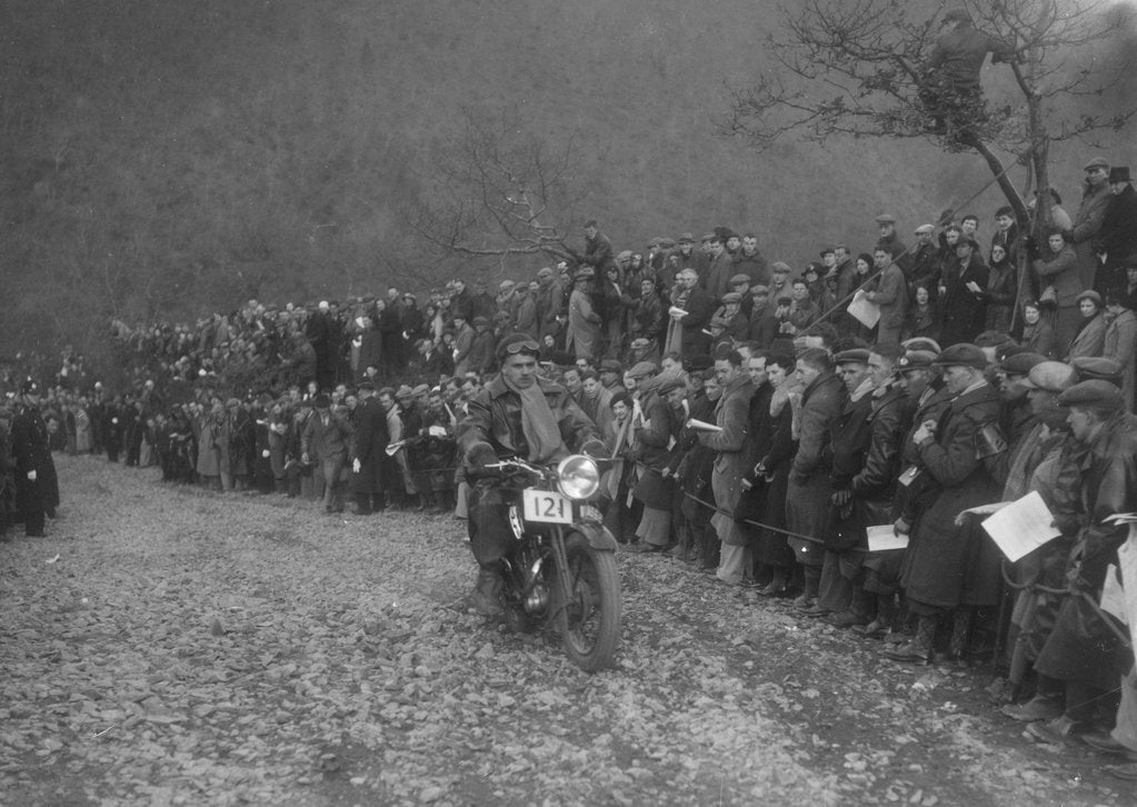 Detail of 250 cc Triumph of J Stagg competing in the MCC Lands End Trial, Beggars Roost, Devon, 1936 by Bill Brunell