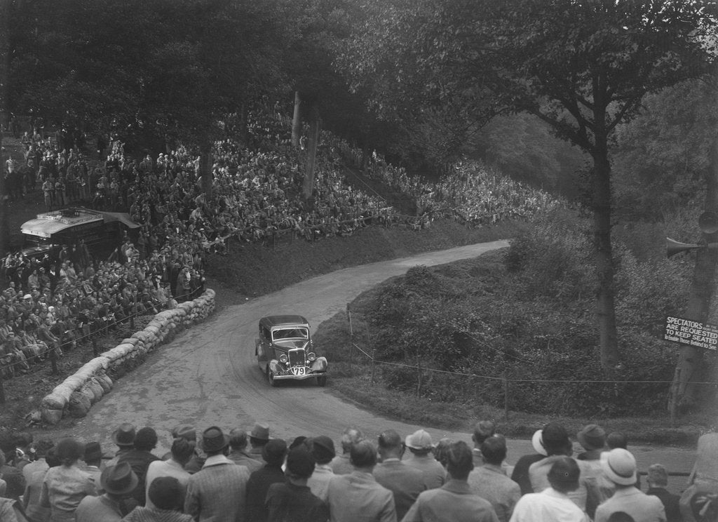Detail of Ford V8 saloon competing in the Shelsley Walsh Hillclimb, Worcestershire, 1935 by Bill Brunell