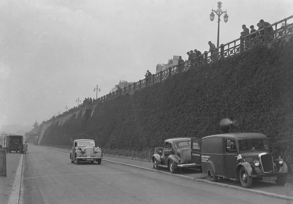 Detail of Daimler of CM Simpson and a Morris loudspeaker van on Madeira Drive, Brighton, RAC Rally, 1939 by Bill Brunell