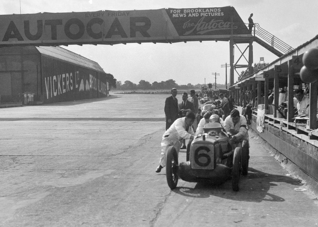 Detail of 'Rubber Duck', works Austin 7 of Charles Goodacre in the pits, BRDC 500 Mile Race, Brooklands, 1931 by Bill Brunell