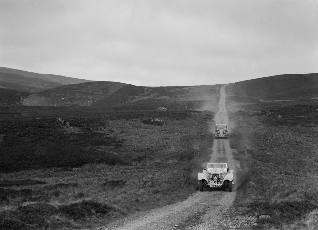 Detail of SS Jaguar 100 open 2-seater and Humber saloon competing in the RSAC Scottish Rally, 1939 by Bill Brunell
