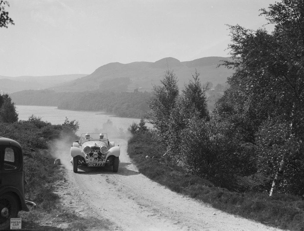 Detail of SS Jaguar 100 open 2-seater of Miss E Violet Watson competing in the RSAC Scottish Rally, 1939 by Bill Brunell