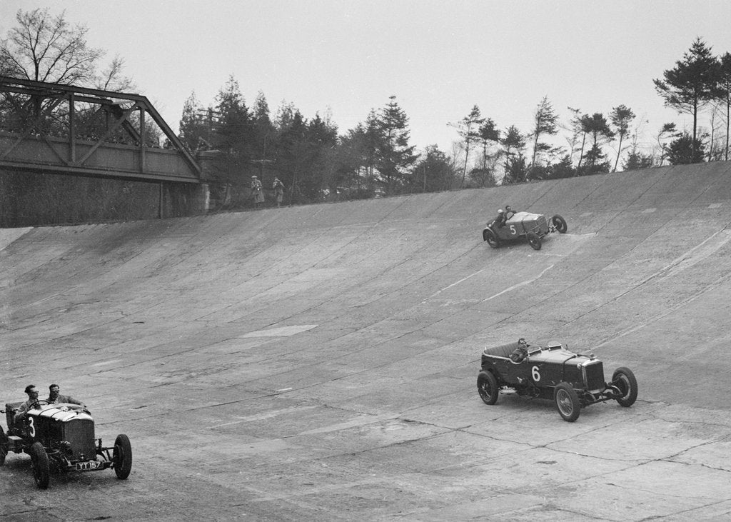 Detail of Bentley of Major H Butler and Sunbeam of BO Davis racing at a BARC meeting, Brooklands, 1930 by Bill Brunell