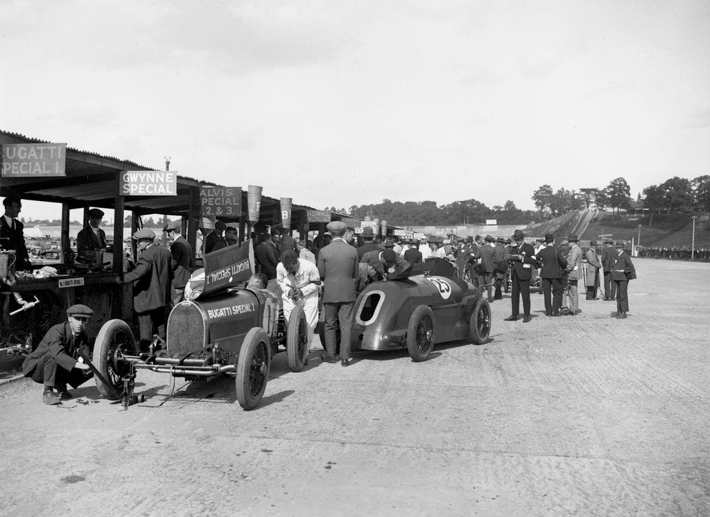 Detail of Bugatti Special 1 and Gwynne Special in the pits at a BARC meeting, Brooklands, 1933 by Bill Brunell