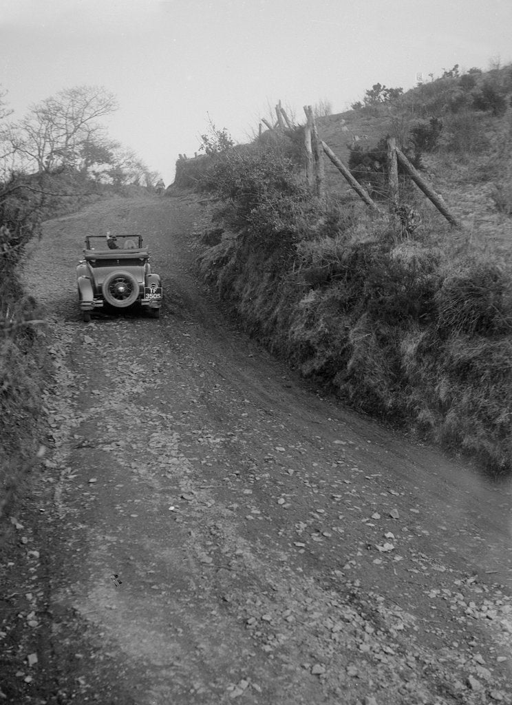 Detail of Kitty Brunell driving a 1930 2-seater Ford Model A, 1931. by Bill Brunell