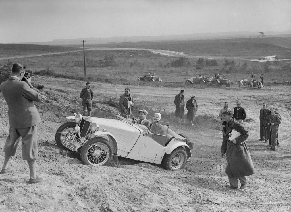 Detail of MG TA of the Cream Cracker Team competing in the Great Weat Motor Club Trial, 1938 by Bill Brunell