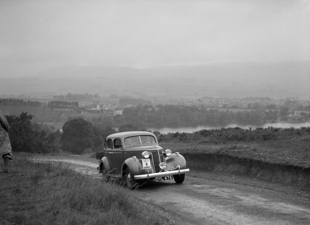 Detail of Ford V8 saloon competing in the South Wales Auto Club Welsh Rally, 1937 by Bill Brunell