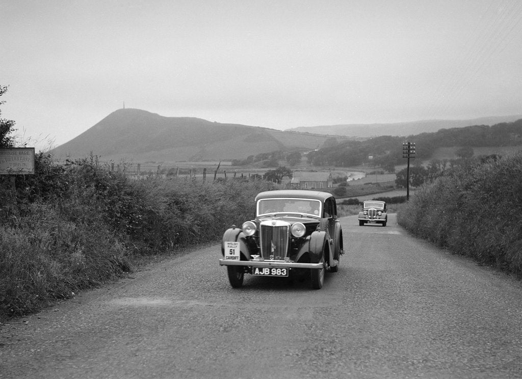 Detail of MG VA of RK Wellsteed ahead of a Wolseley saloon at the South Wales Auto Club Welsh Rally, 1937 by Bill Brunell