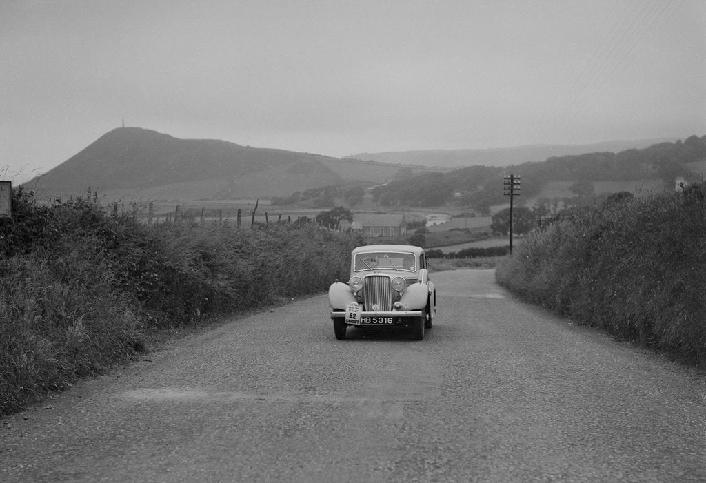 Detail of Jaguar SS saloon of N Howfield competing in the South Wales Auto Club Welsh Rally, 1937 by Bill Brunell