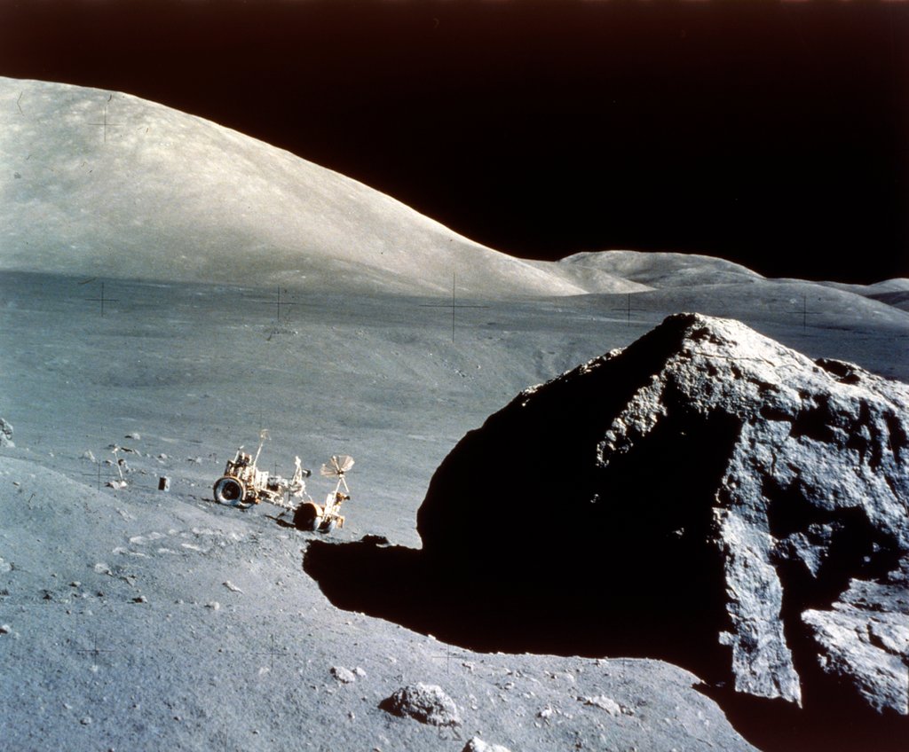 Detail of The Rover is dwarfed by a giant rock on the lunar surface, Apollo 17 mission, December 1972 by NASA