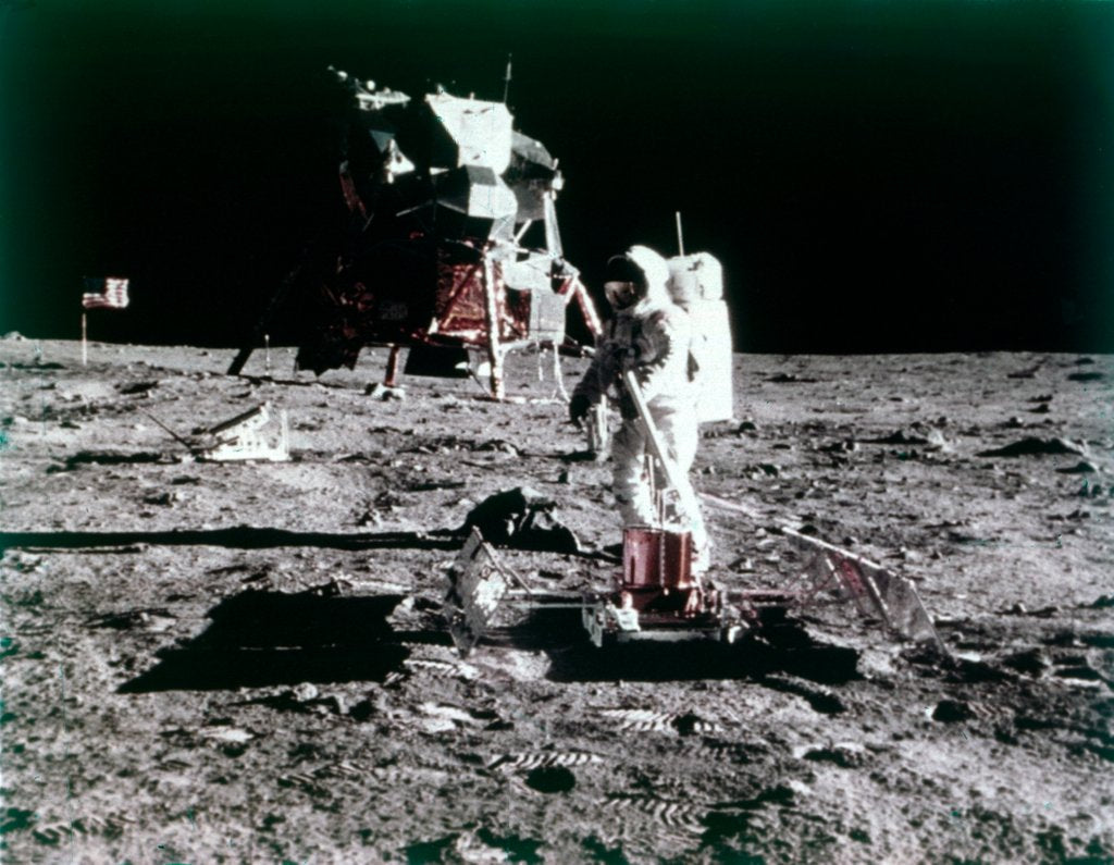 Detail of Buzz Aldrin sets up the seismic experiment, Apollo II mission, July 1969 by Neil Armstrong