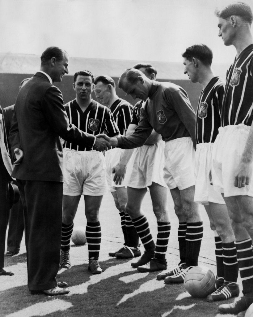 Detail of Prince Philip meeting members of Manchester City team by Associated Newspapers