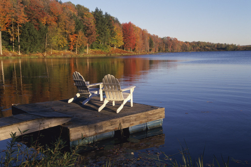 Detail of Adirondack Chairs on Dock at Lake by Anonymous