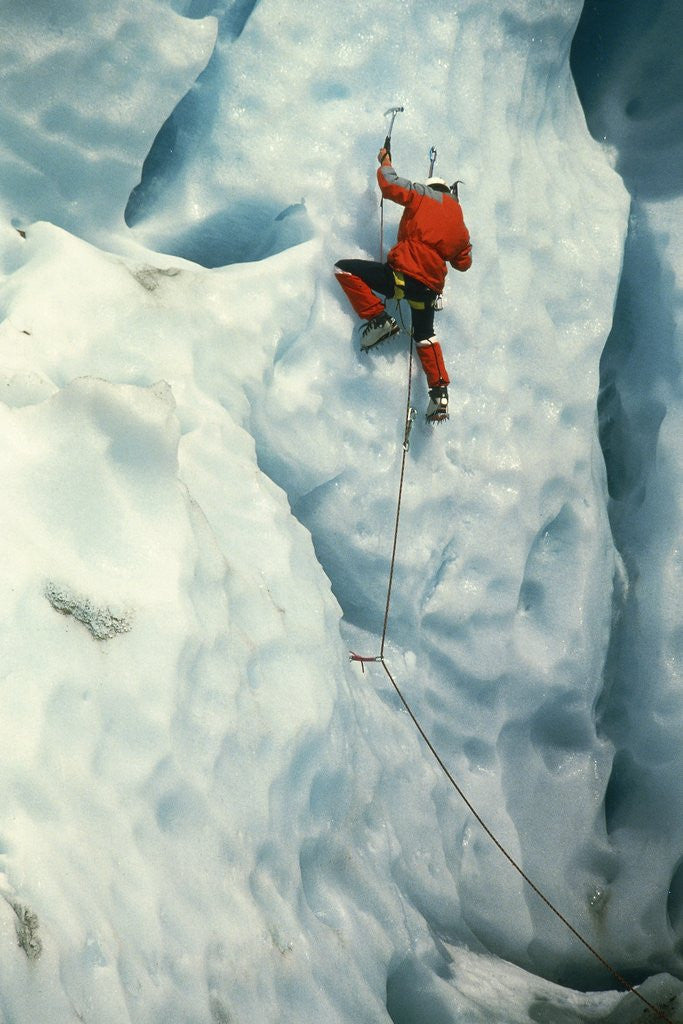 Detail of Mountain climber at ice wall by Corbis