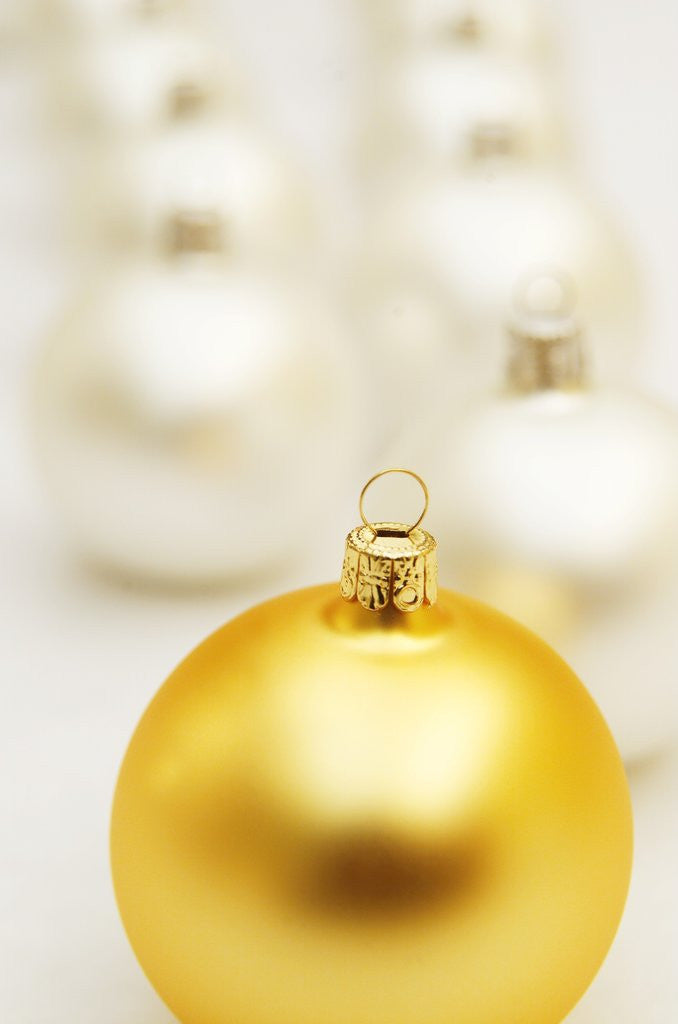 Detail of White Christmas tree decorations and a yellow one by Anonymous