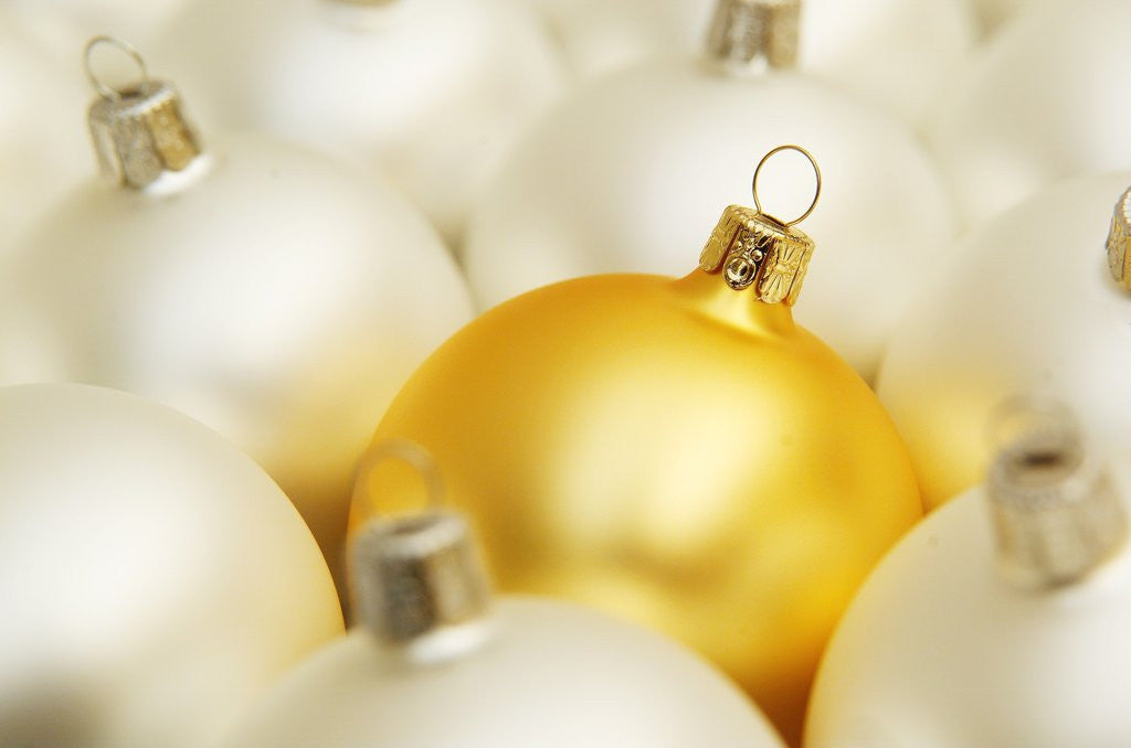 Detail of White Christmas tree decorations and a yellow one by Anonymous