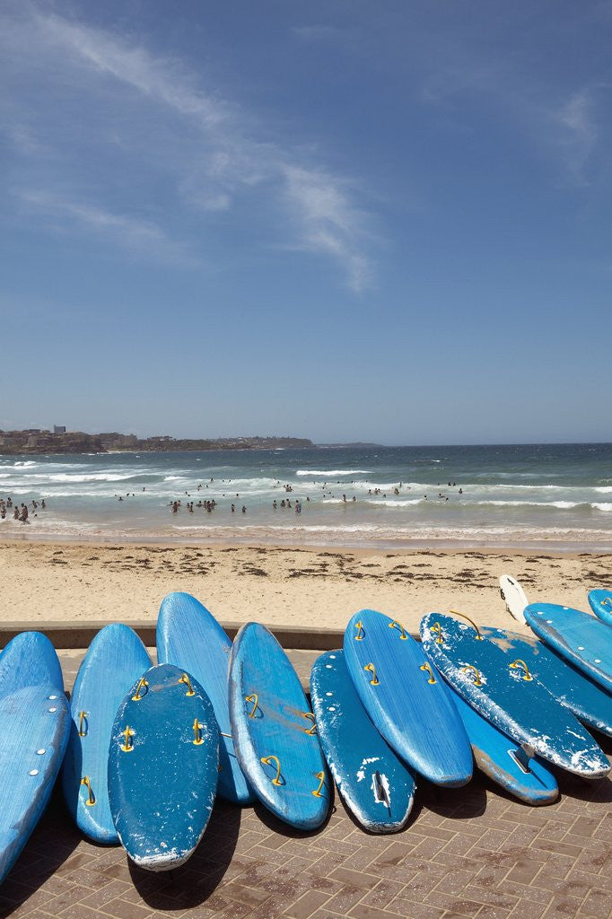 Detail of View of stacked up surfboards at the beach by Anonymous