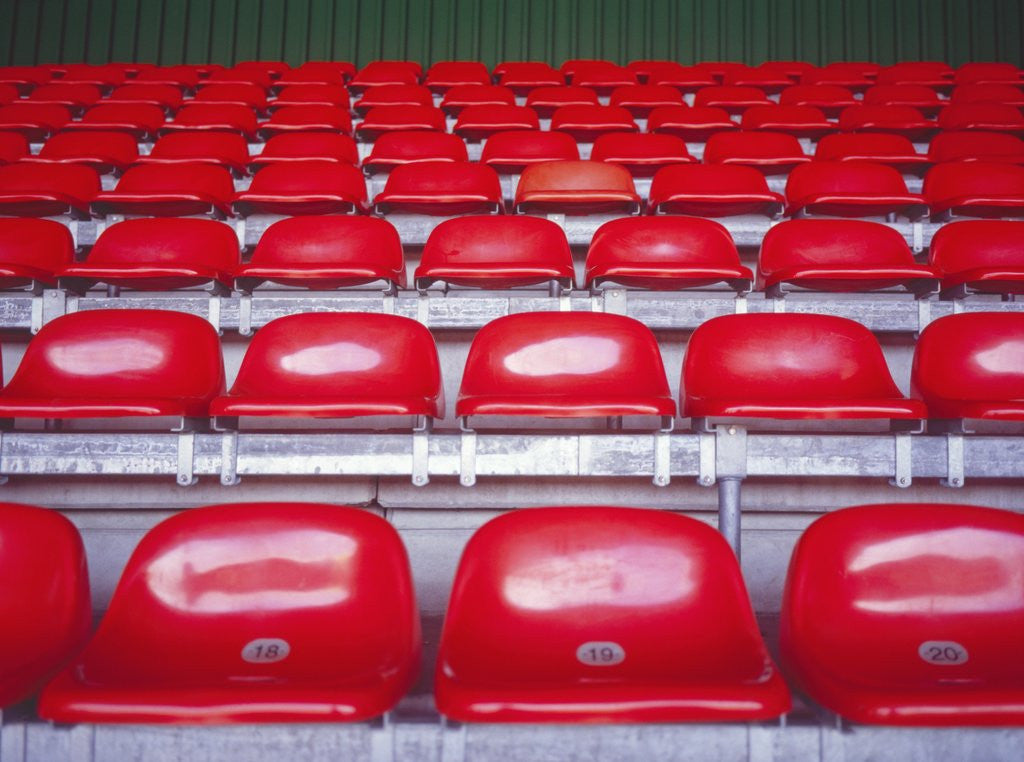Detail of Rows of Empty Seats in Stadium by Corbis