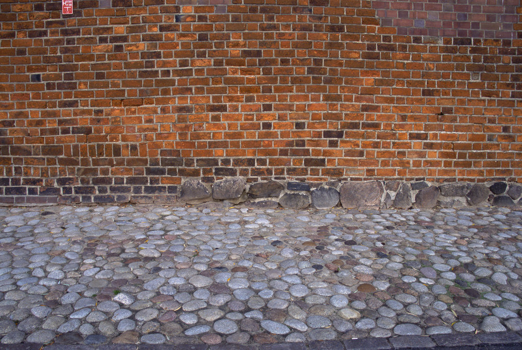 Detail of Cobblestone Street and Brick Wall by Anonymous