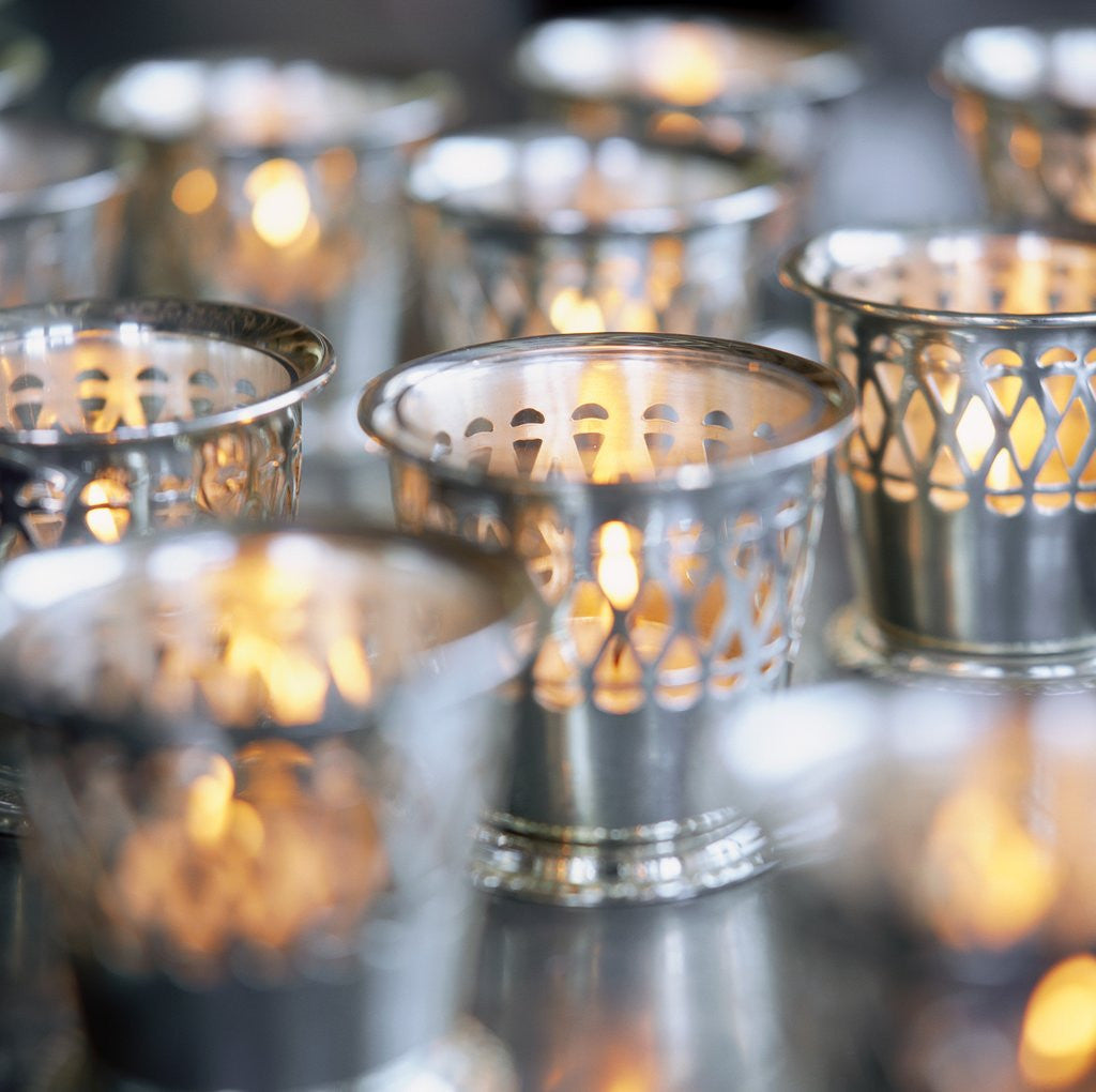Detail of Many Votive Candles in Silver Holders by Anonymous