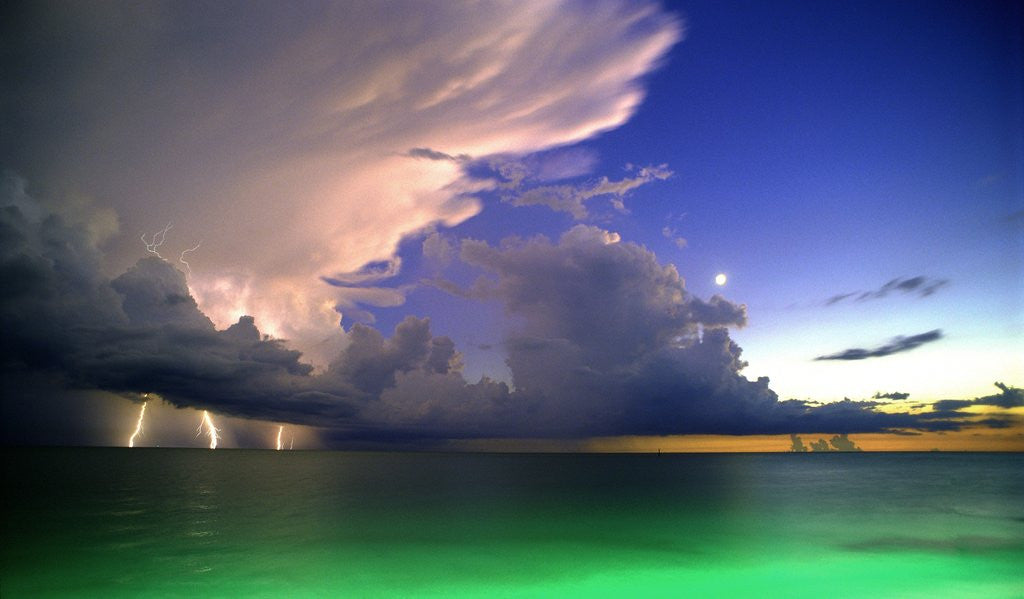 Detail of Lighting striking over green and blue water by Anonymous